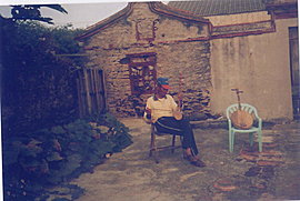 an old Taiwanese gentleman plays the two-stringed viola in a village of the Seven-Beauties 
					Island